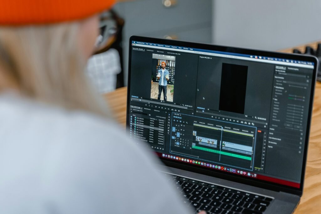 pexels-photo-7679465-7679465 Video Editor, Close-up of video editing software on laptop, focused on timeline.